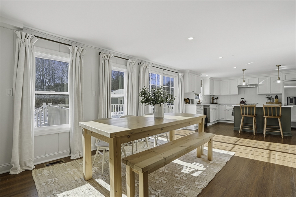 26 Maple Street Mendon, MA 01756 - Photo 15 of 42 a living room with furniture a wooden floor and next to a window