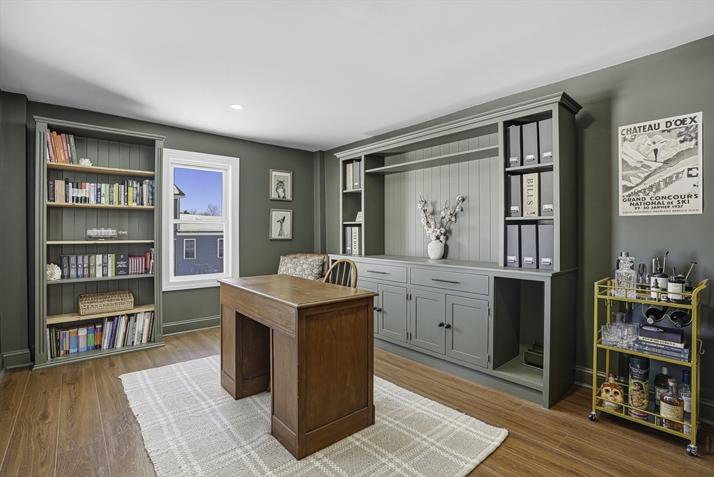 26 Maple Street Mendon, MA 01756 - Photo 21 of 42 a room with cabinets and wooden floor