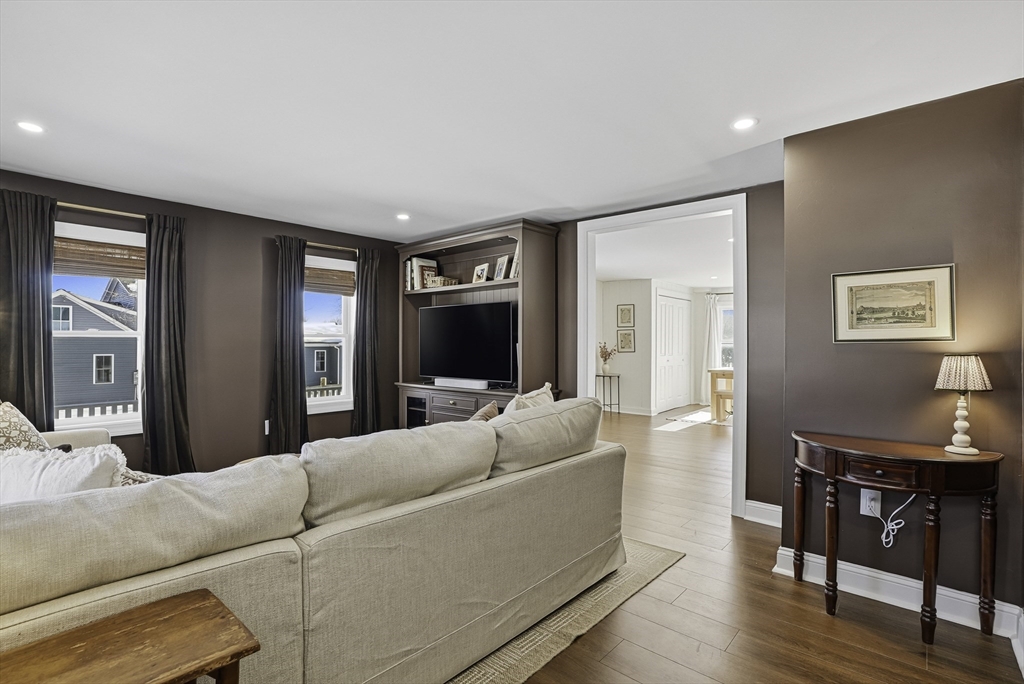 26 Maple Street Mendon, MA 01756 - Photo 22 of 42 a living room with furniture and a flat screen tv