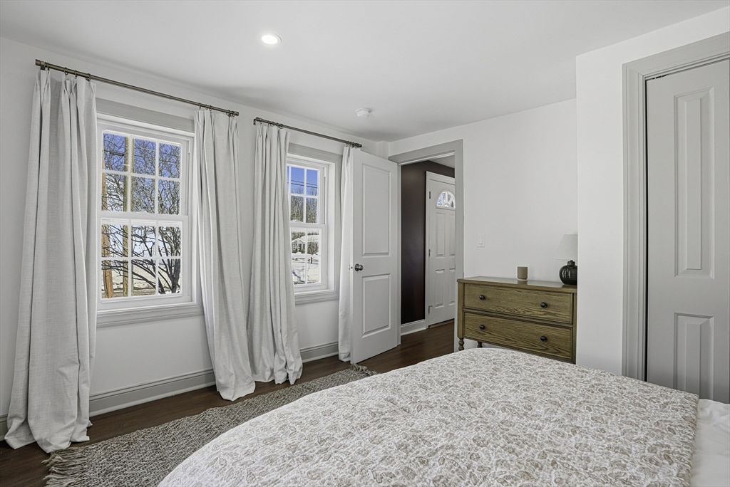 26 Maple Street Mendon, MA 01756 - Photo 27 of 42 an empty room with closet and windows