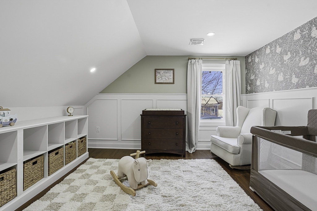 26 Maple Street Mendon, MA 01756 - Photo 32 of 42 a living room with furniture and a window