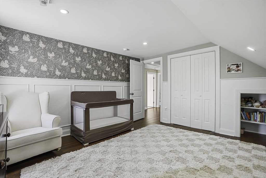 26 Maple Street Mendon, MA 01756 - Photo 33 of 42 a living room with furniture and a fireplace