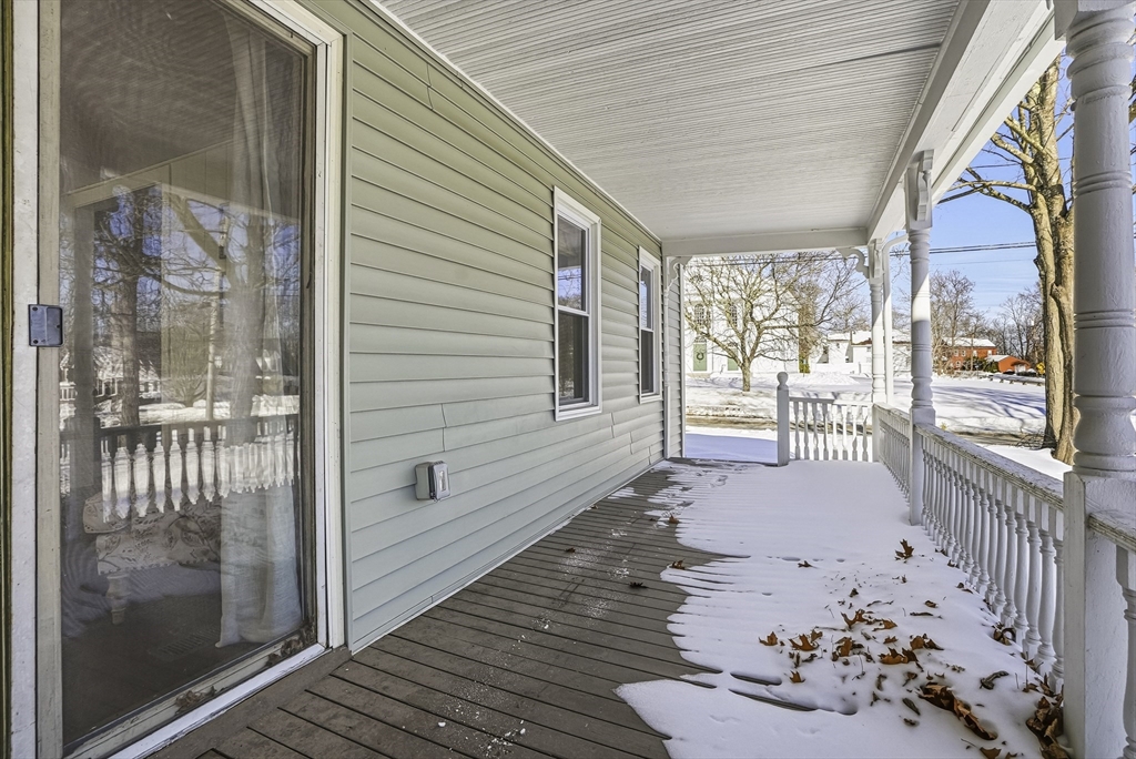 26 Maple Street Mendon, MA 01756 - Photo 35 of 42 a view of a porch with wooden floor and outdoor space