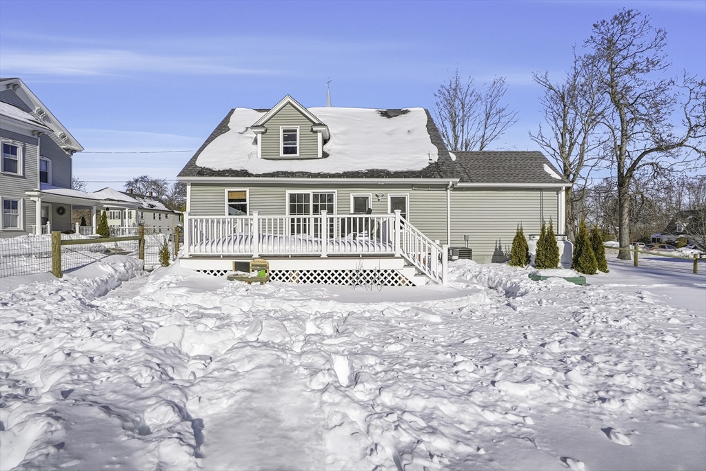 26 Maple Street Mendon, MA 01756 - Photo 36 of 42 a front view of a house with a yard