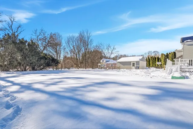 a view of road with a building in the background