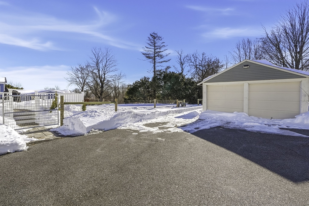 26 Maple Street Mendon, MA 01756 - Photo 42 of 42 a view of a house with a snow on the road