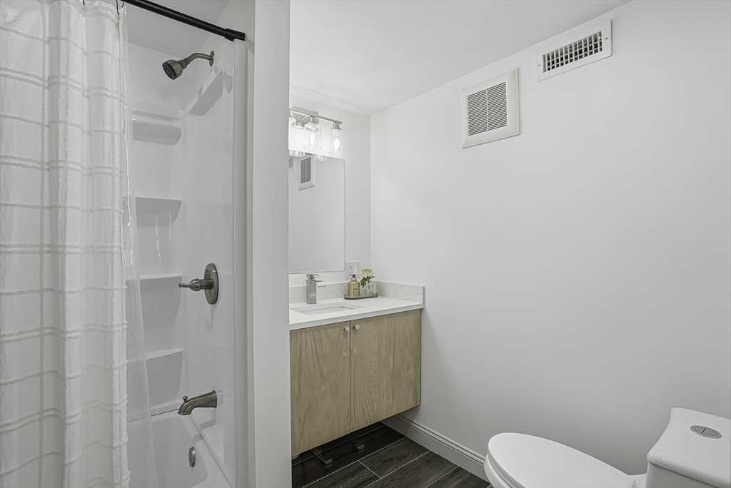 26 Maple Street Mendon, MA 01756 - Photo 6 of 42 a bathroom with a sink toilet and shower