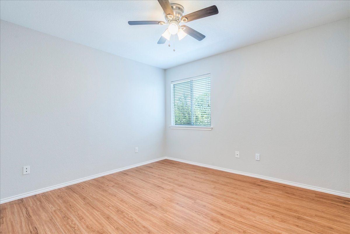 1507 Davis Mountain Loop Cedar Park, TX 78613 - Photo 19 of 30 Guest bedroom has ceiling fan and walk in closet