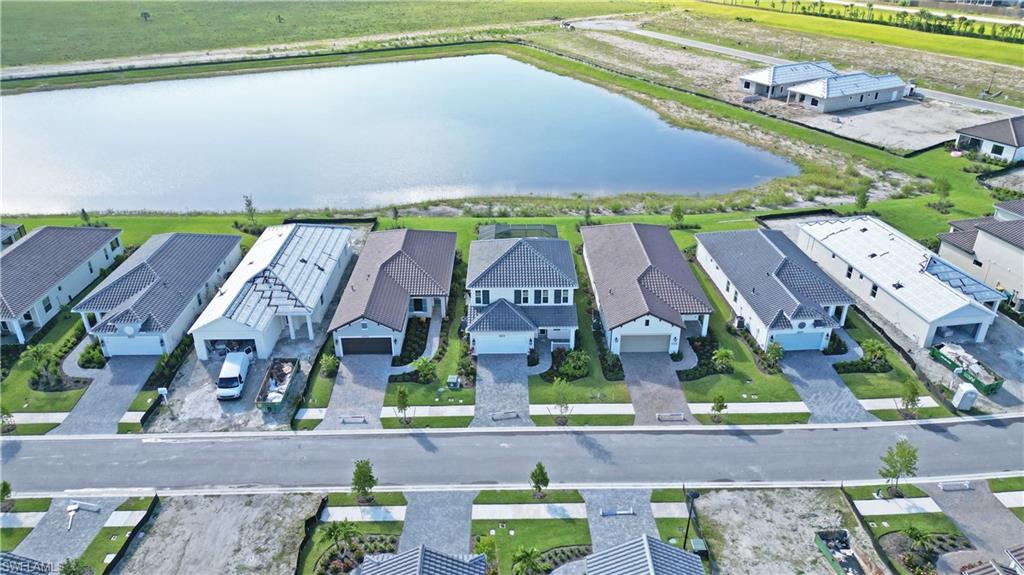 4652 Centaurus Circle Naples, FL 34120 - Photo 36 of 45 Aerial view of residential area with a large body of water