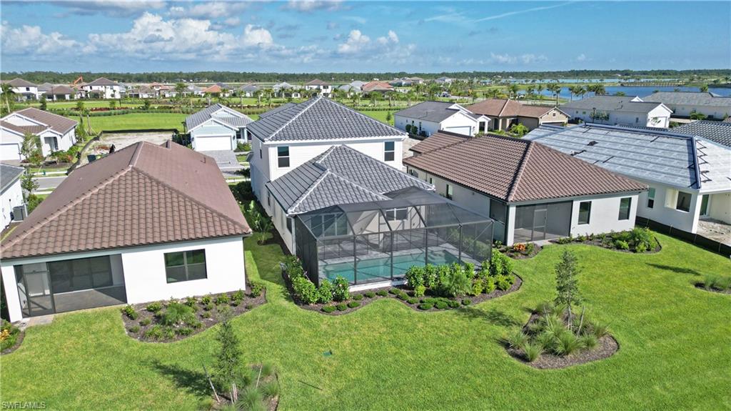 4652 Centaurus Circle Naples, FL 34120 - Photo 37 of 45 Aerial perspective of suburban area