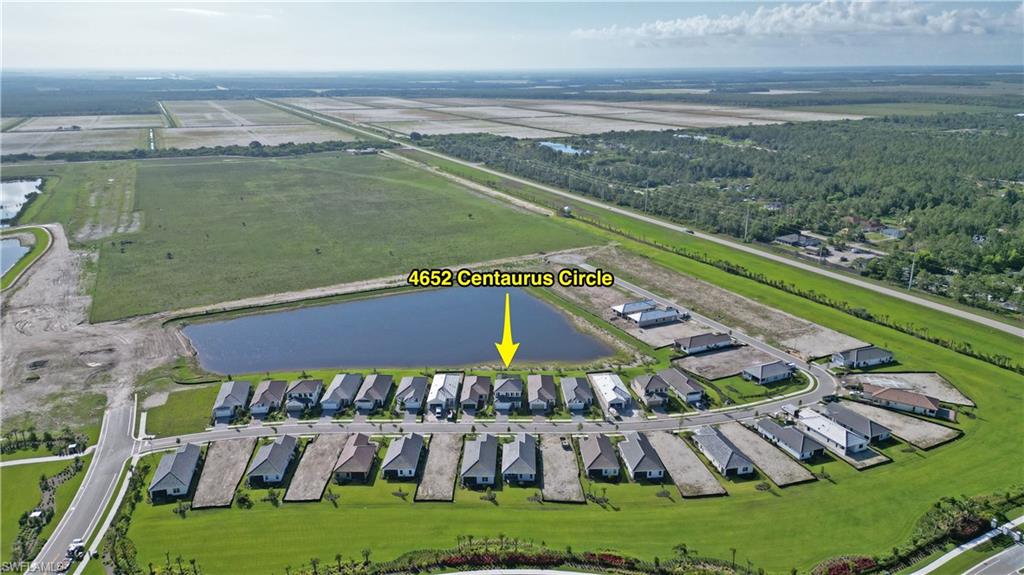 4652 Centaurus Circle Naples, FL 34120 - Photo 38 of 45 Aerial view of a large body of water