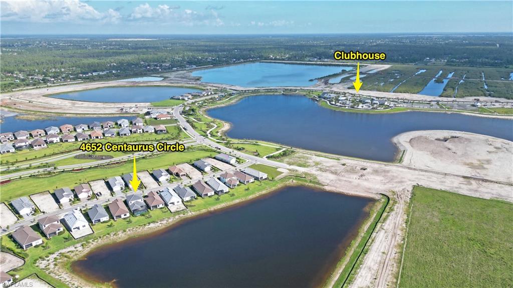 4652 Centaurus Circle Naples, FL 34120 - Photo 40 of 45 View of property location featuring a large body of water and nearby suburban area