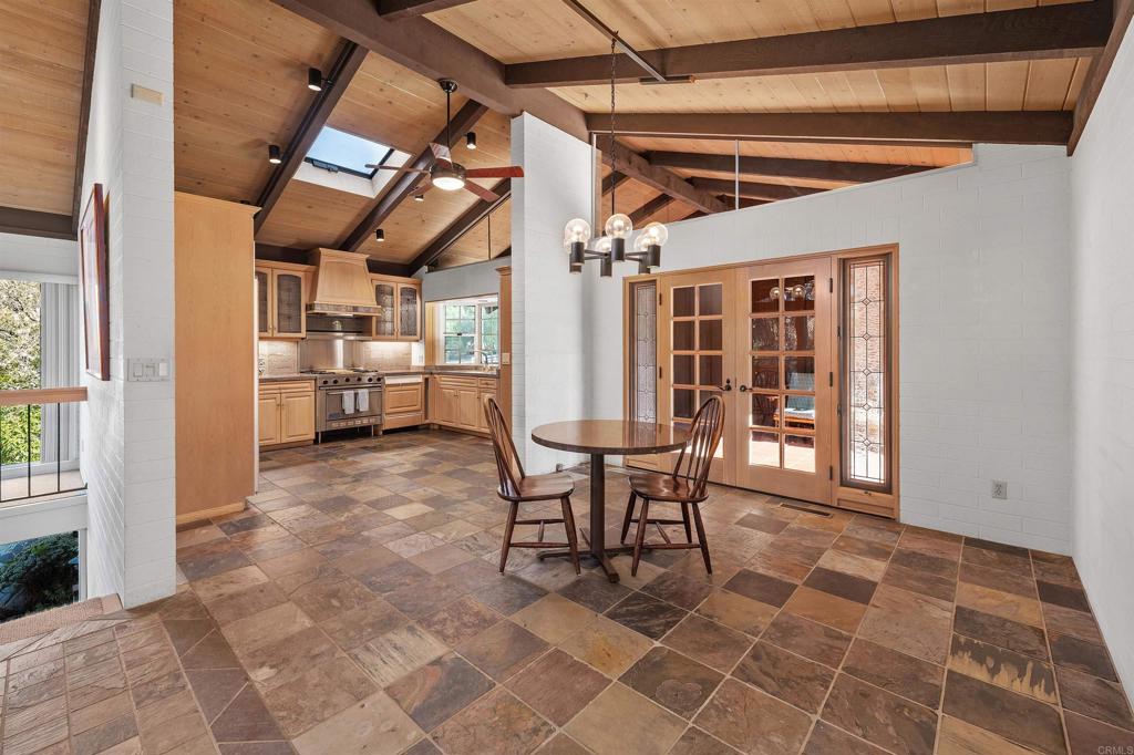 16522 Orchard Bend Road Poway, CA 92064 - Photo 7 of 26 a view of a dining space with furniture