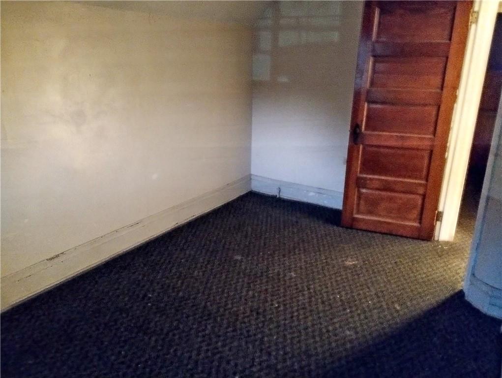 803 11th Street McKees Rocks, PA 15136 - Photo 8 of 14 wooden floor in an empty room