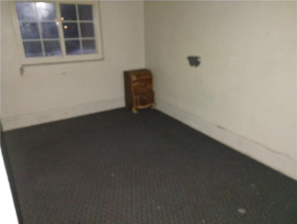 803 11th Street McKees Rocks, PA 15136 - Photo 9 of 14 a view of an empty room with a window