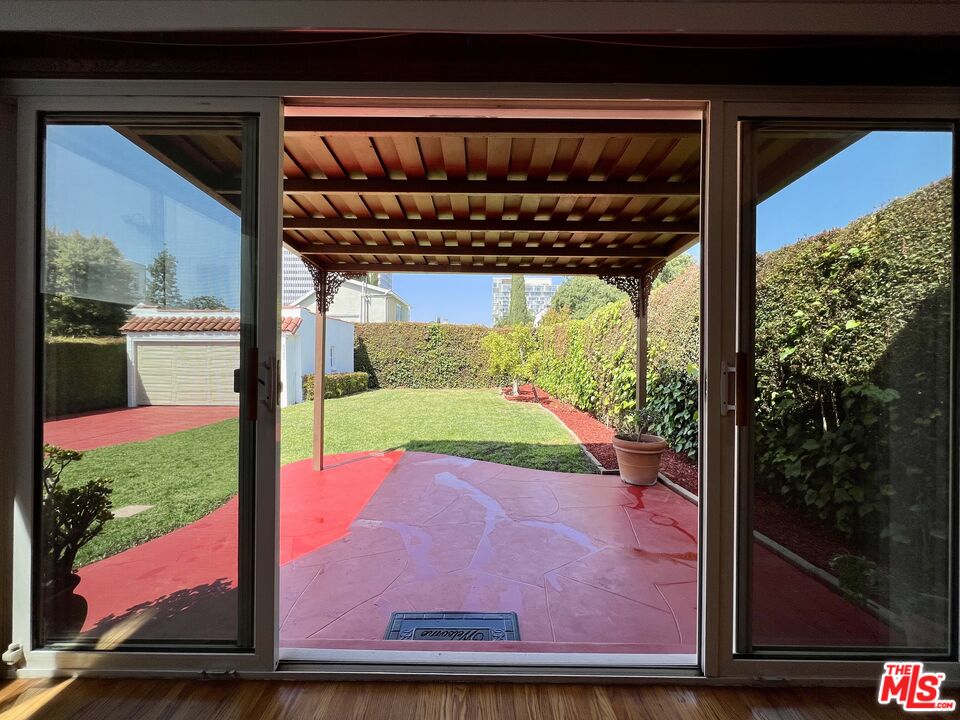 6187 Barrows Drive Los Angeles, CA 90048 - Photo 29 of 35 a view of swimming pool from a window