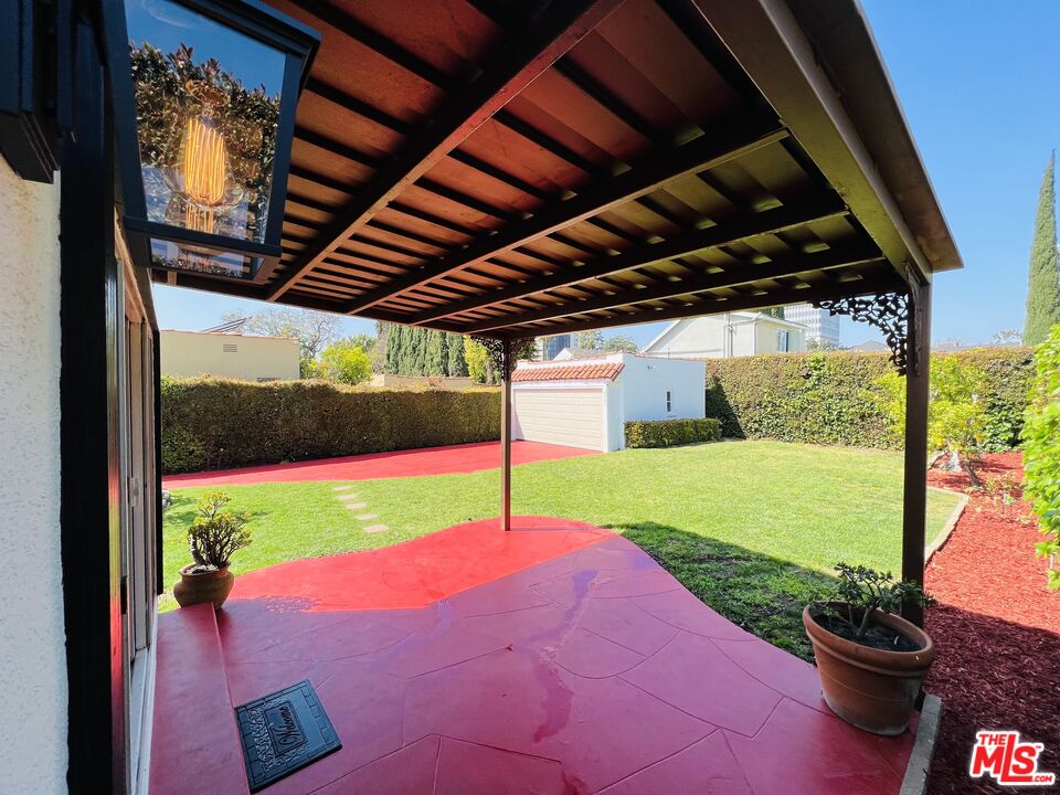 6187 Barrows Drive Los Angeles, CA 90048 - Photo 30 of 35 a view of a room with porch and wooden floor