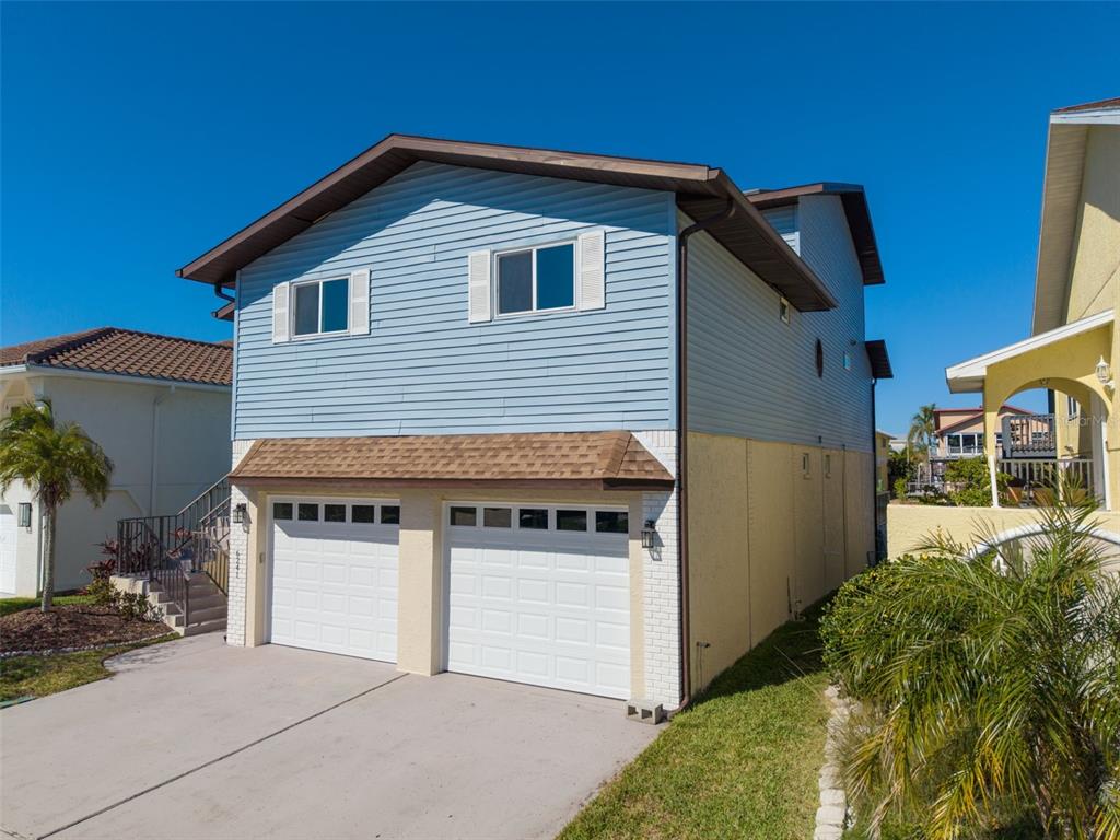 6241 Bayside Drive New Port Richey, FL 34652 - Photo 64 of 78 a front view of a house with yard