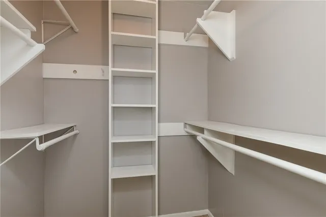 a view of an empty walk in closet