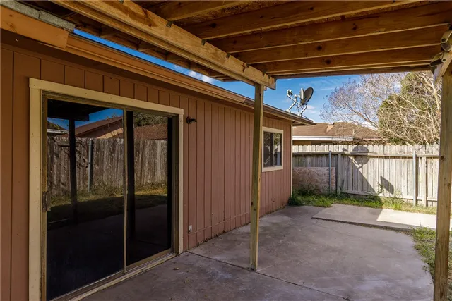 a view of backyard with cabin