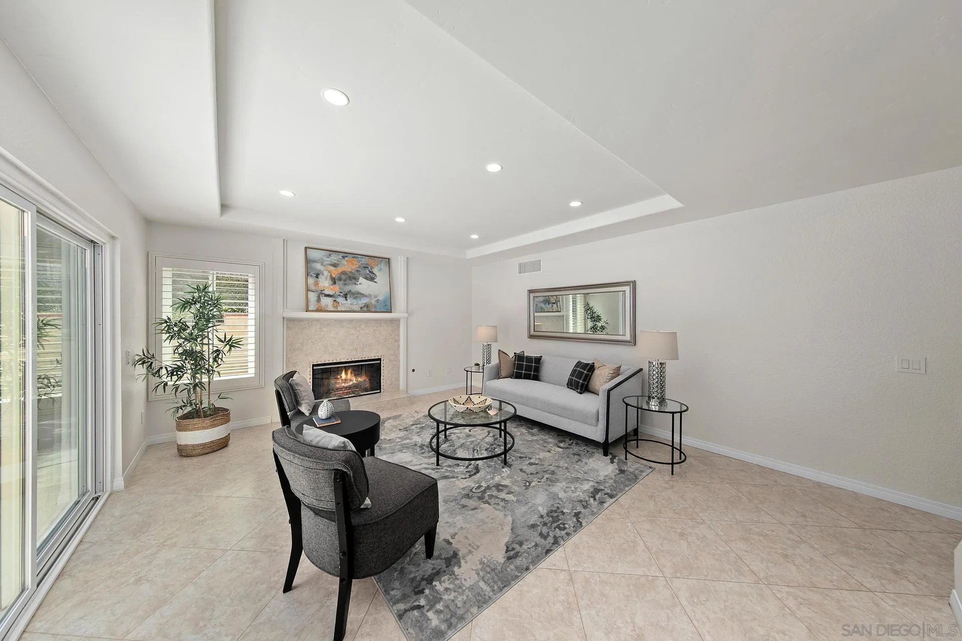 1971 Avenida Joaquin Encinitas, CA 92024 - Photo 13 of 33 a living room with furniture and a clock