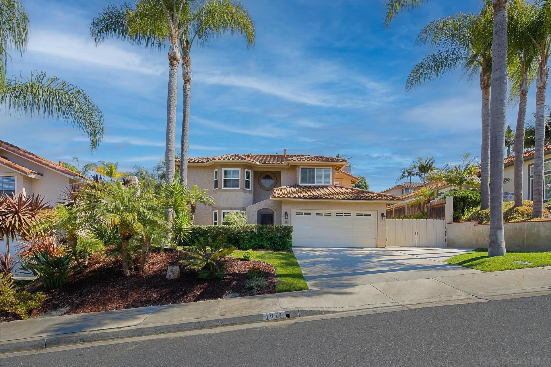 1971 Avenida Joaquin Encinitas, CA 92024 - Photo 2 of 33 a front view of a house with garden