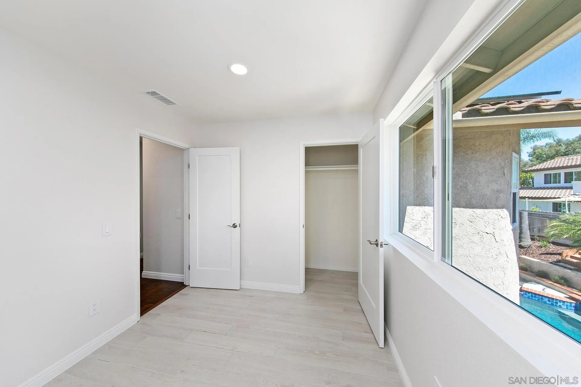 1971 Avenida Joaquin Encinitas, CA 92024 - Photo 23 of 33 a view of hallway with windows