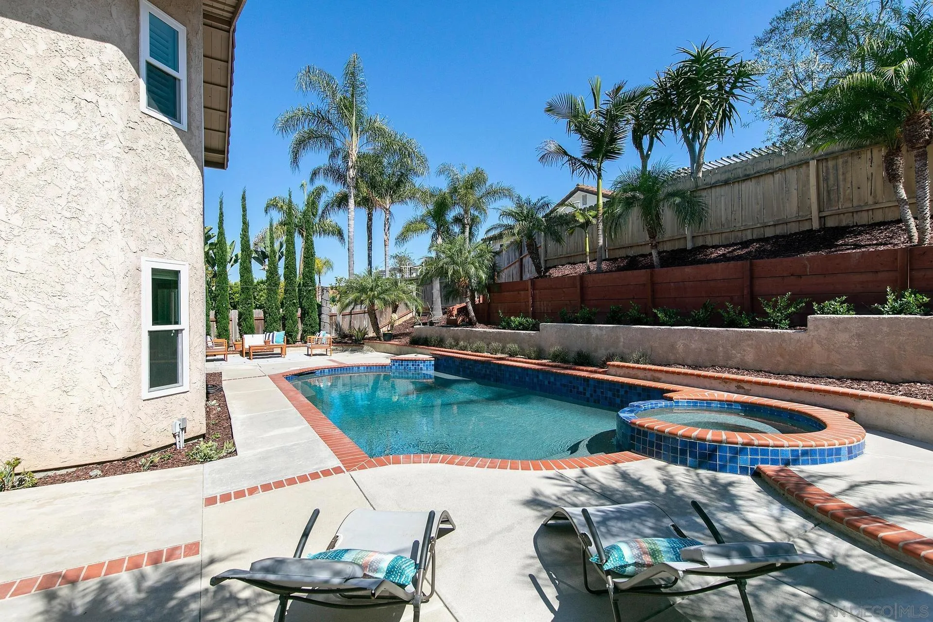 1971 Avenida Joaquin Encinitas, CA 92024 - Photo 27 of 33 a view of a swimming pool with a patio