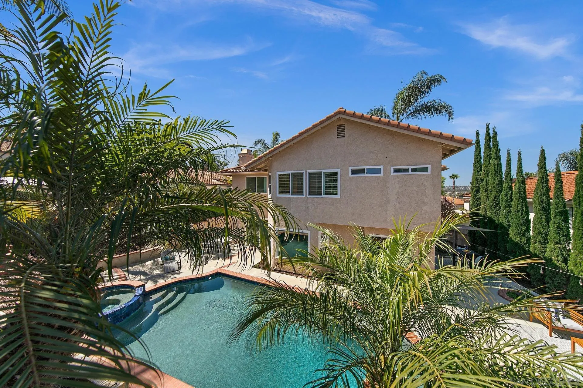 1971 Avenida Joaquin Encinitas, CA 92024 - Photo 29 of 33 a house with trees in the background