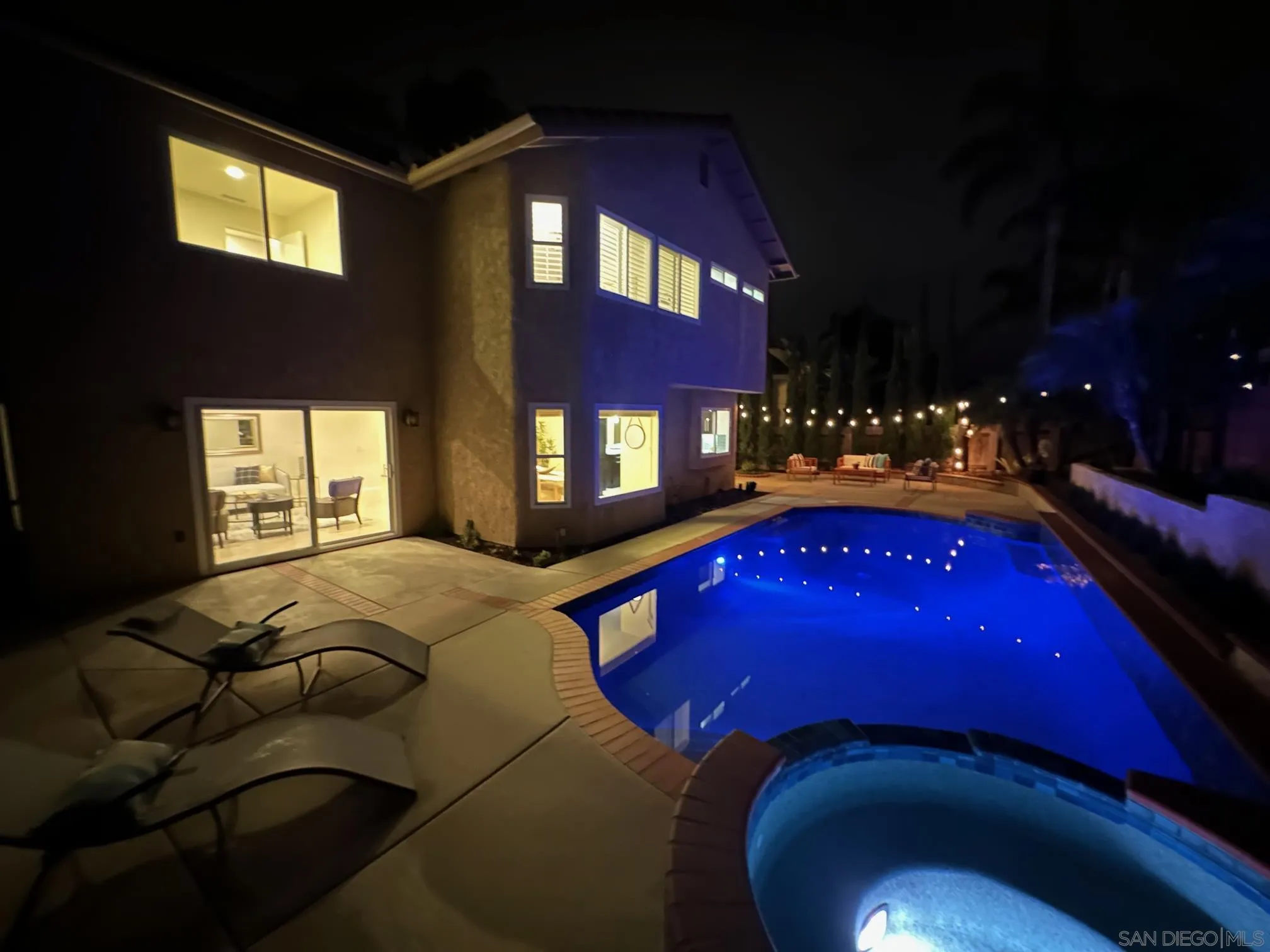 1971 Avenida Joaquin Encinitas, CA 92024 - Photo 30 of 33 a bed sitting in a bedroom next to a window