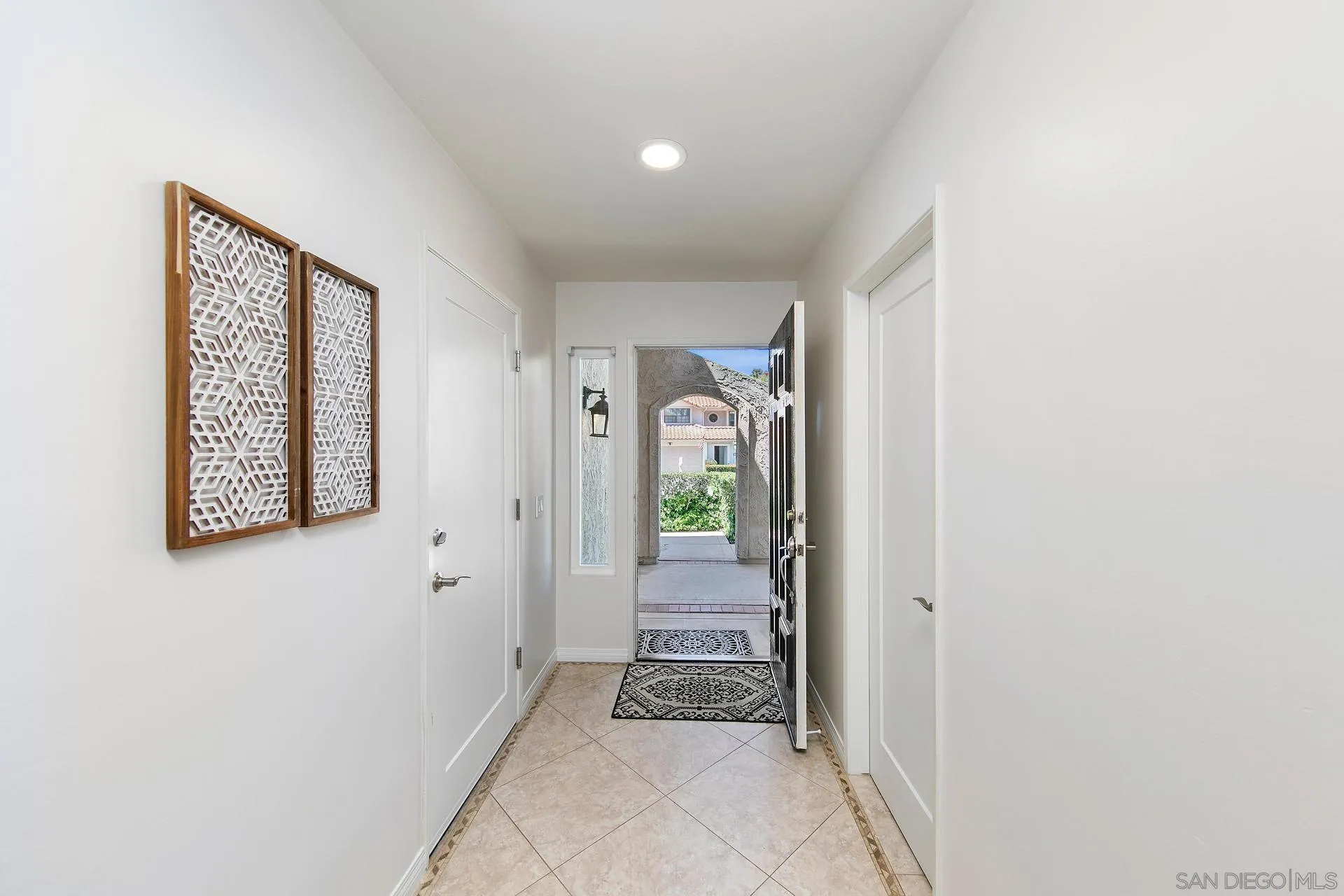1971 Avenida Joaquin Encinitas, CA 92024 - Photo 4 of 33 a view of a hallway with front door