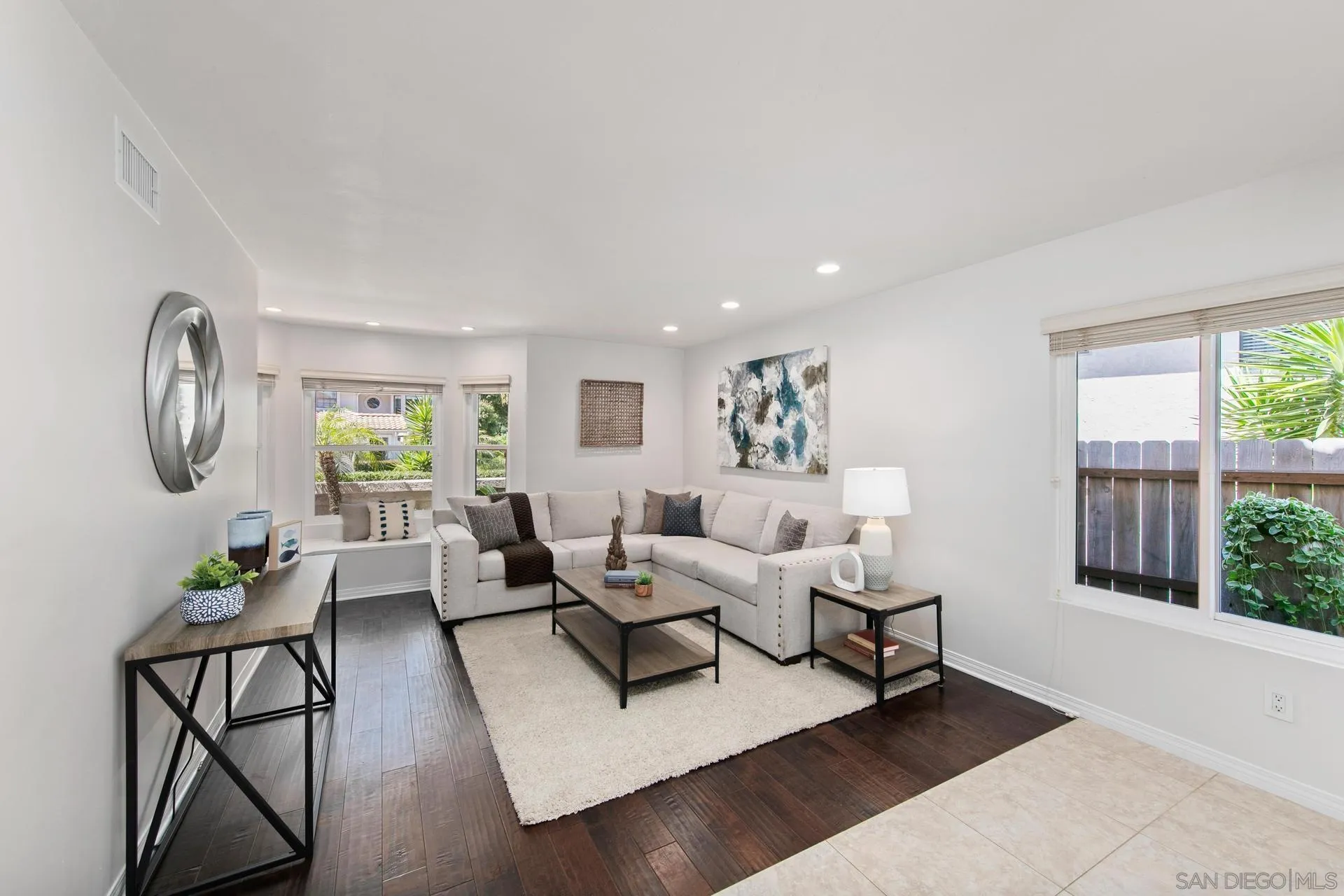 1971 Avenida Joaquin Encinitas, CA 92024 - Photo 9 of 33 a living room with furniture a table and a large window