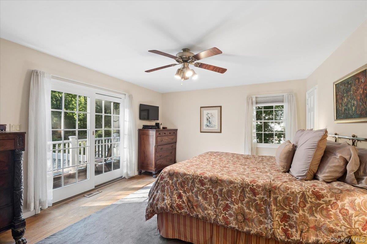 372 Fort Hill Road Scarsdale, NY 10583 - Photo 15 of 40 Primary bedroom retreat with doors to private deck