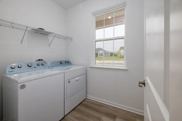 a utility room with dryer and washer