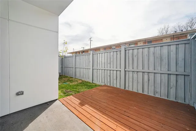 a balcony with a yard