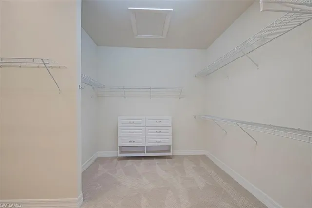 a view of an empty walk in closet