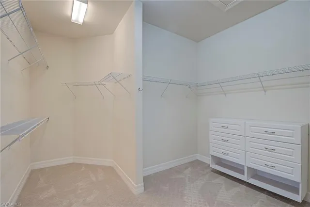 a view of an empty walk in closet