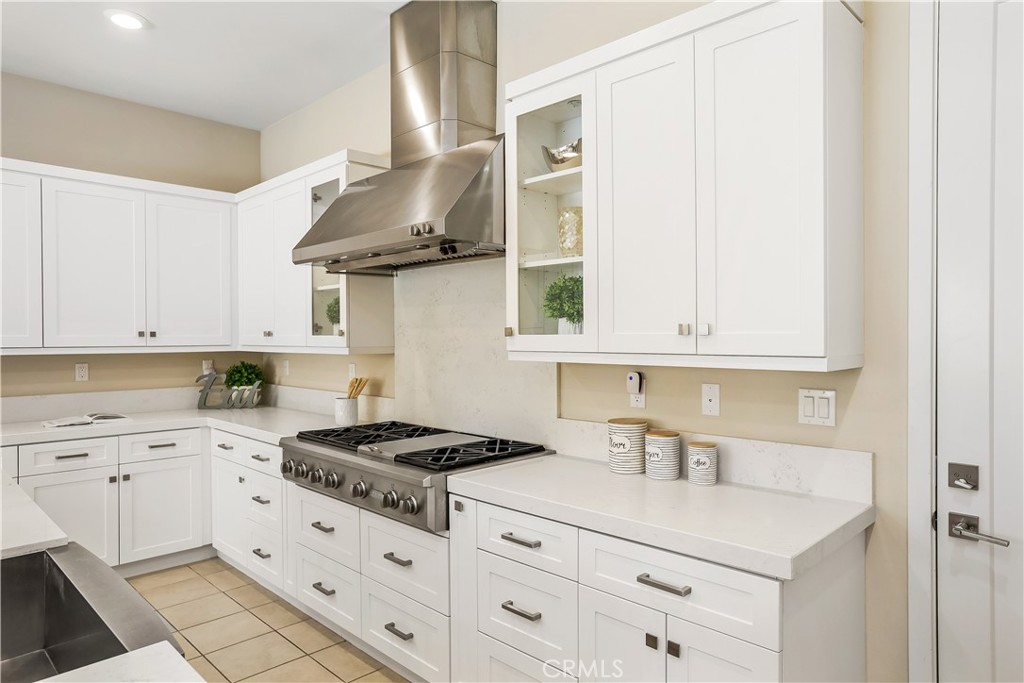117 Swift Irvine, CA 92618 - Photo 18 of 62 a kitchen with stainless steel appliances a sink stove and cabinets