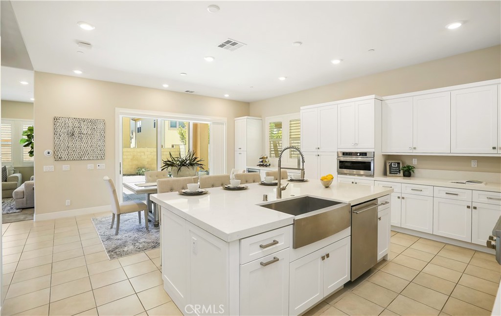 117 Swift Irvine, CA 92618 - Photo 19 of 62 a kitchen with a sink stove and cabinets