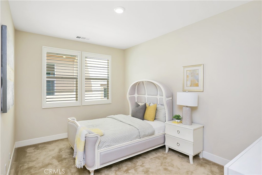 117 Swift Irvine, CA 92618 - Photo 42 of 62 a bed room with a bed and a window