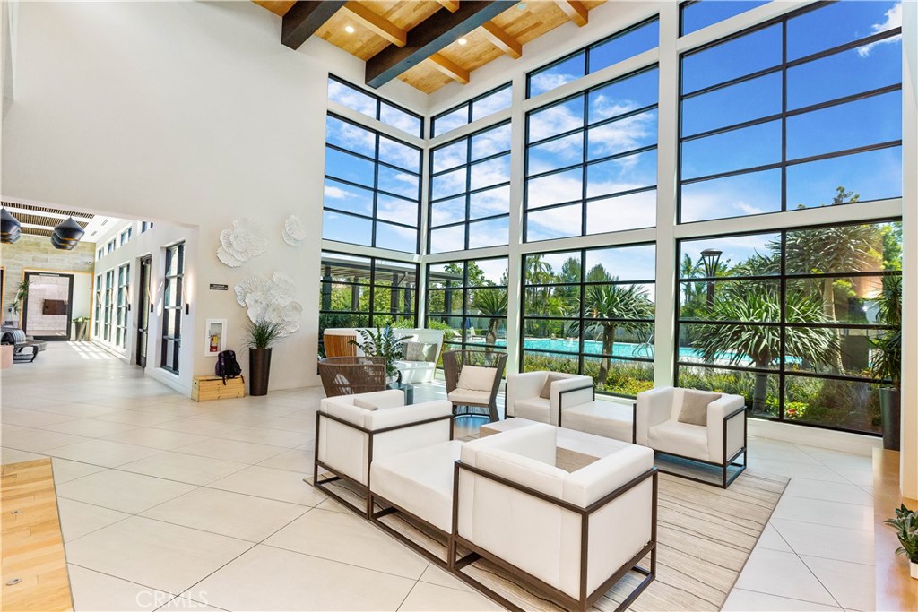 117 Swift Irvine, CA 92618 - Photo 56 of 62 a living room with furniture and a floor to ceiling window