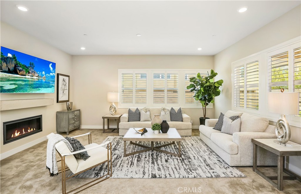 117 Swift Irvine, CA 92618 - Photo 6 of 62 a living room with furniture and a fireplace