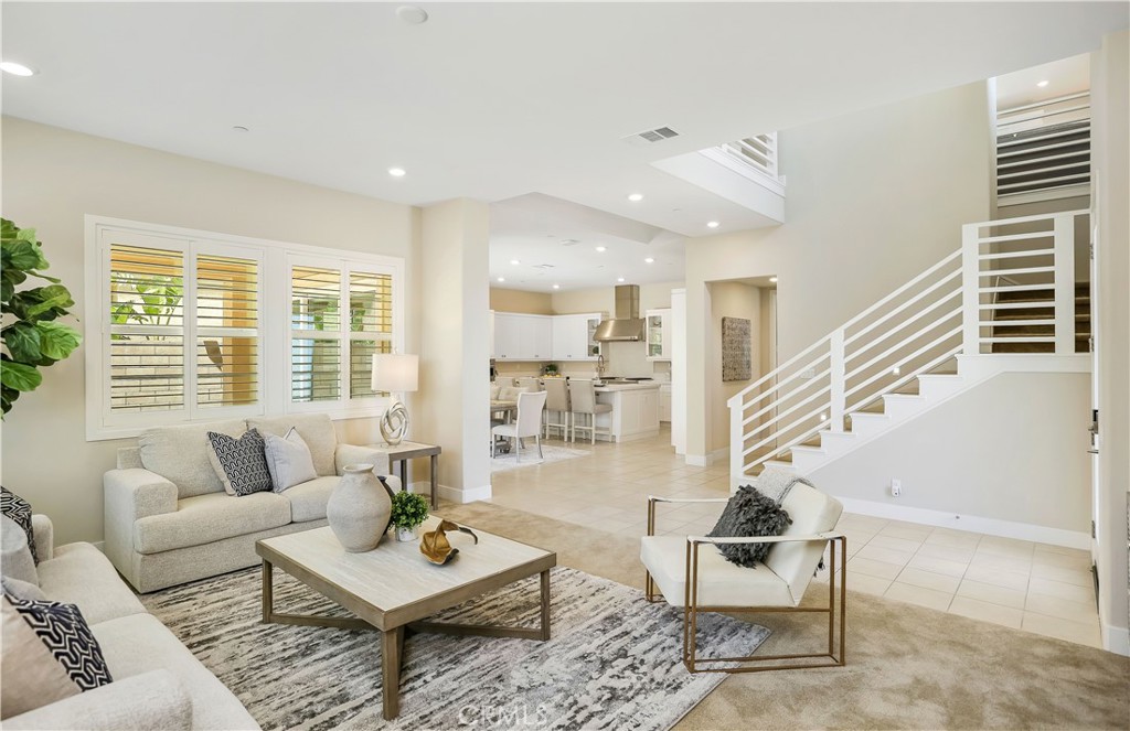 117 Swift Irvine, CA 92618 - Photo 9 of 62 a living room with furniture and a large window