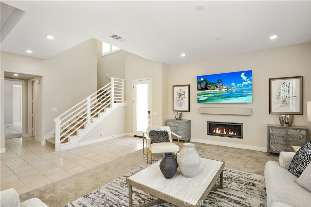 117 Swift Irvine, CA 92618 - Photo 10 of 62 a living room with furniture and a fireplace
