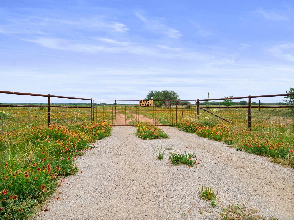 8557 Farm To Market 586 Bangs, TX 76823 - Photo 1 of 14 a view of a lake with a beach