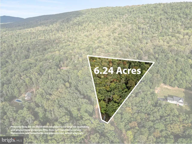 a view of balcony with wooden floor and a mountain view