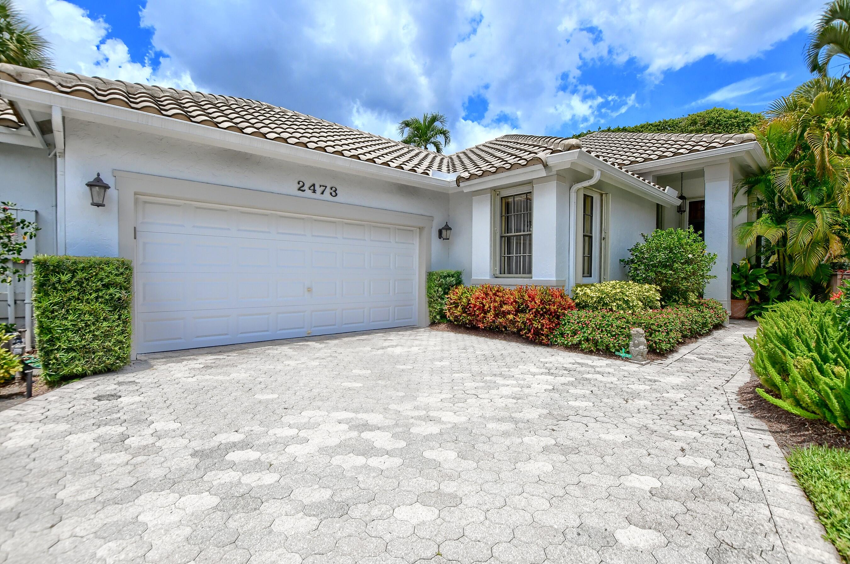 2473 Northwest 64th Street Boca Raton, FL 33496 - Photo 1 of 39 03_ebf_4145-hdr(5)