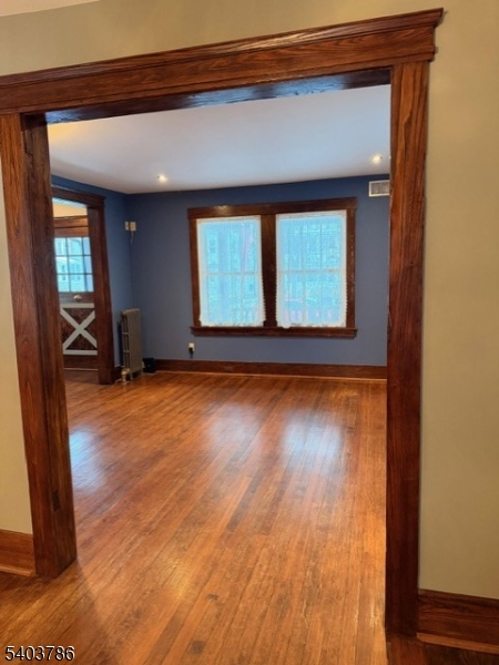 19 Academy Road Morris Plains, NJ 07950 - Photo 5 of 39 a view of a room with wooden floor and a window