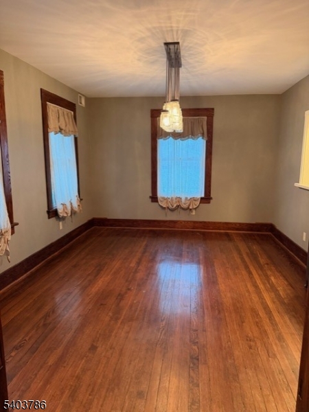 19 Academy Road Morris Plains, NJ 07950 - Photo 7 of 39 a view of empty room with wooden floor