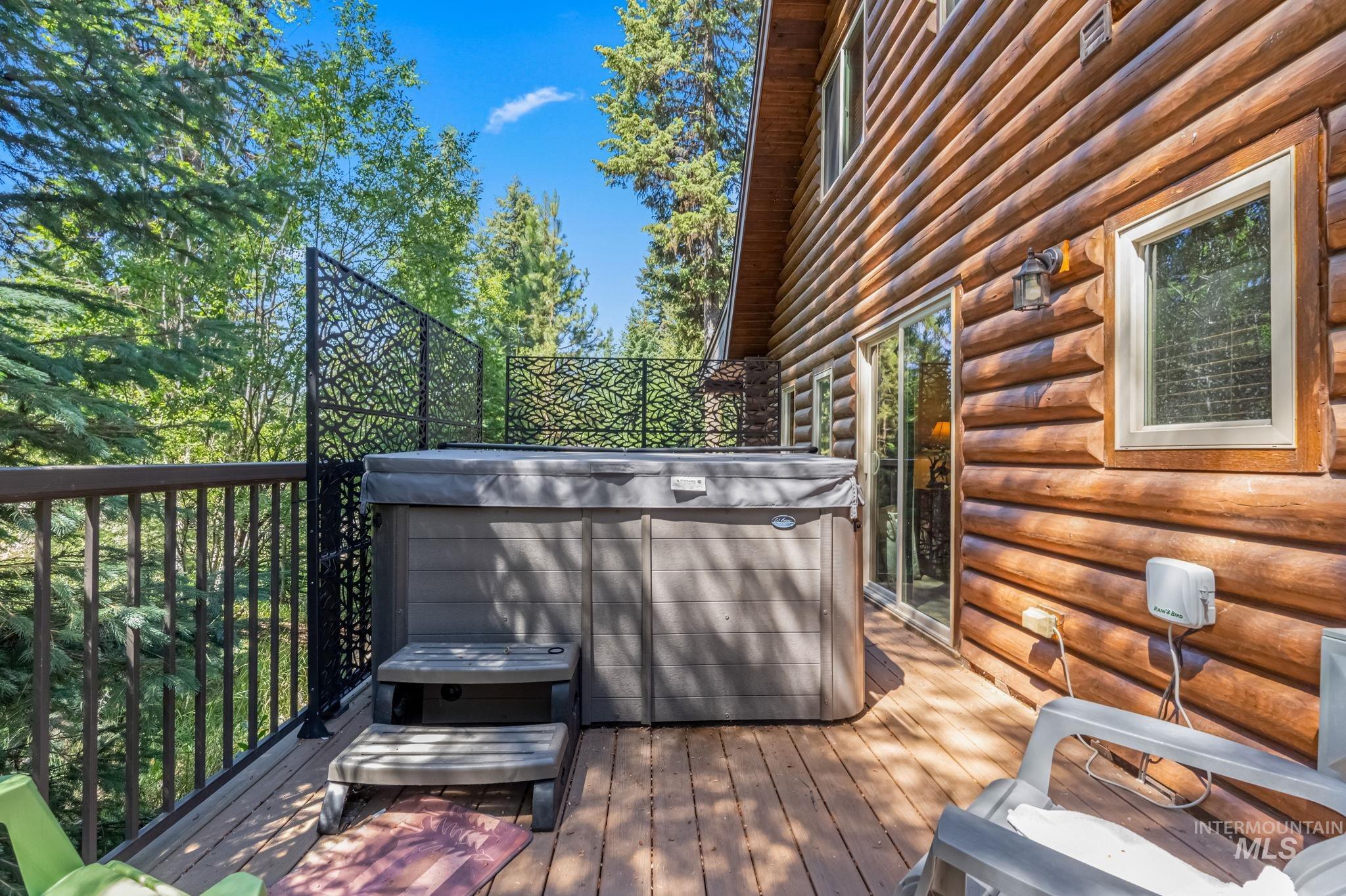 1160 Bell Flower Place McCall, ID 83638 - Photo 24 of 45 Deck with a hot tub